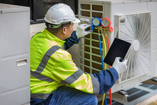 Professional Heat Pump Repair technician working in Arcadia, IN